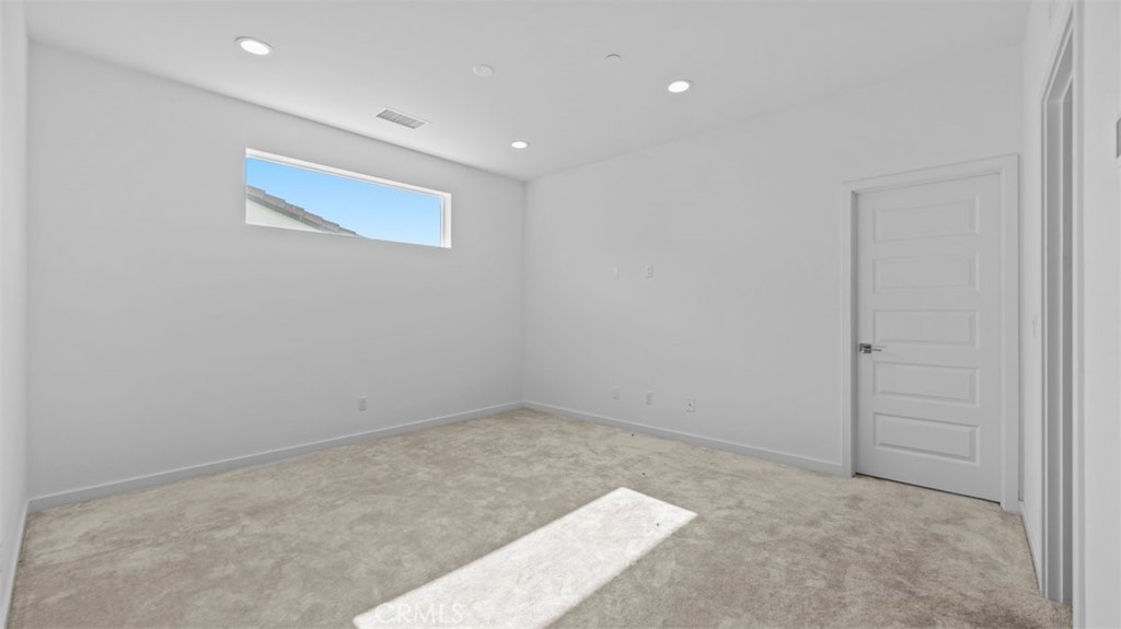 7044 Mallow Drive Mall, Unit 4 Fontana, CA 92336 - Photo 10 of 19 an empty room with a workbench