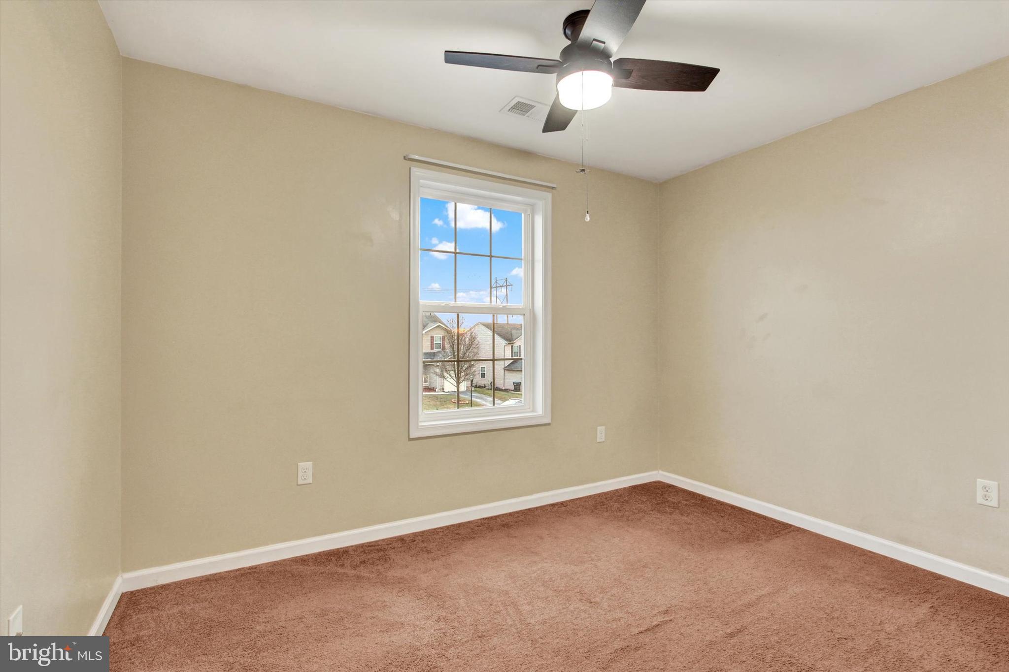 58 Skyview Circle Hanover, PA 17331 - Photo 17 of 31 an empty room with a window and a fan
