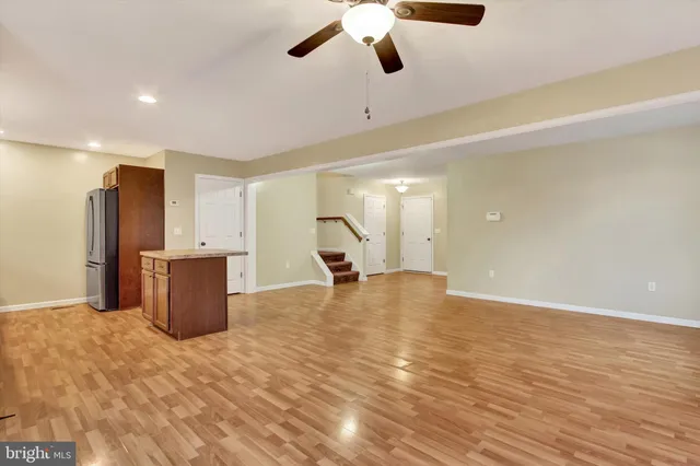 a view of a livingroom with a staircase
