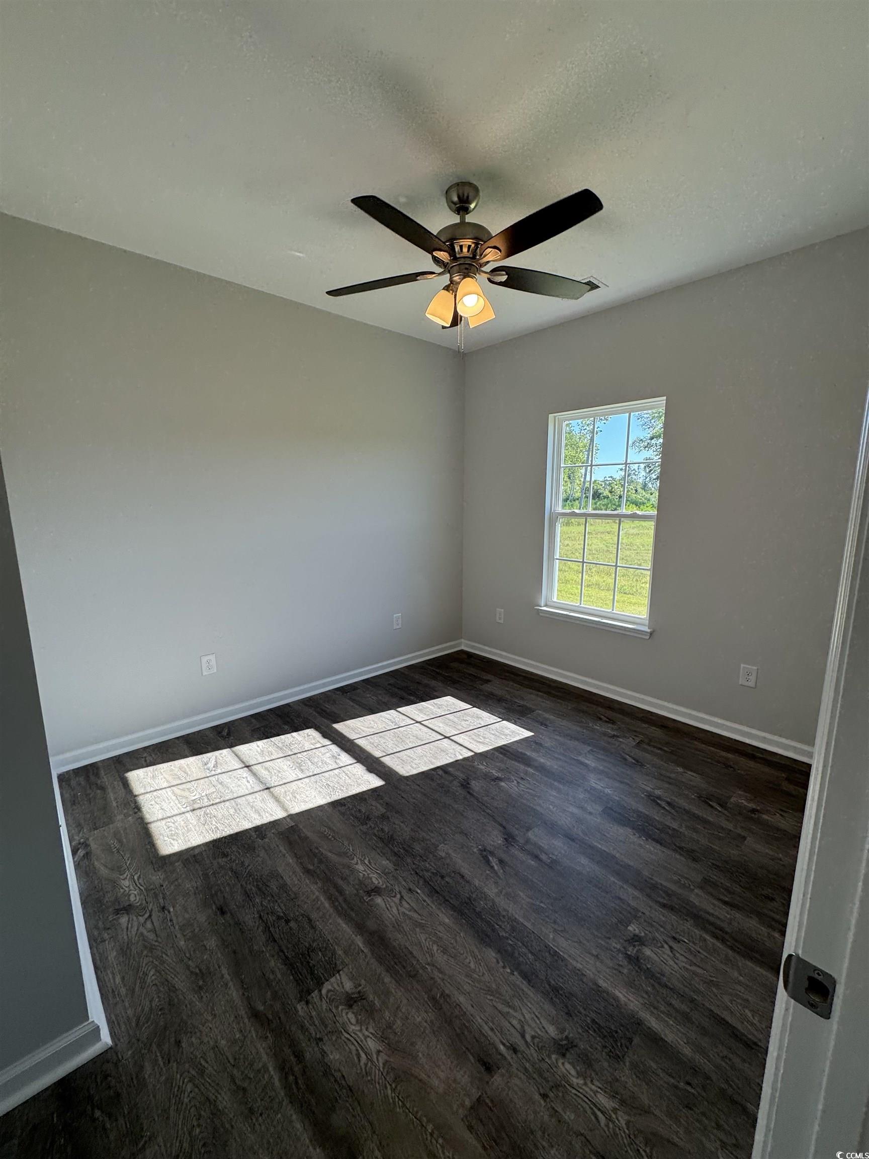 594 Shallow Cv Drive Conway, SC 29527 - Photo 13 of 29 Unfurnished room featuring dark wood finished floo