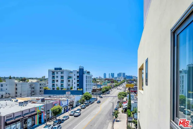 a city view with tall buildings
