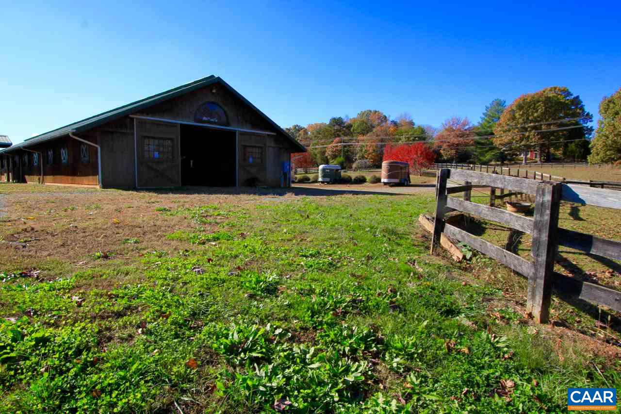 6080-6082 Amicus Road Ruckersville, VA 22968 - Photo 16 of 22 a view of a house with backyard and sitting area