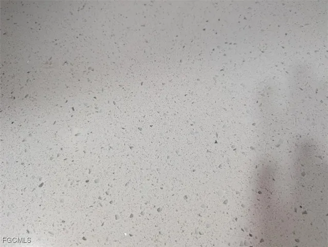 a close up of a white marble wall