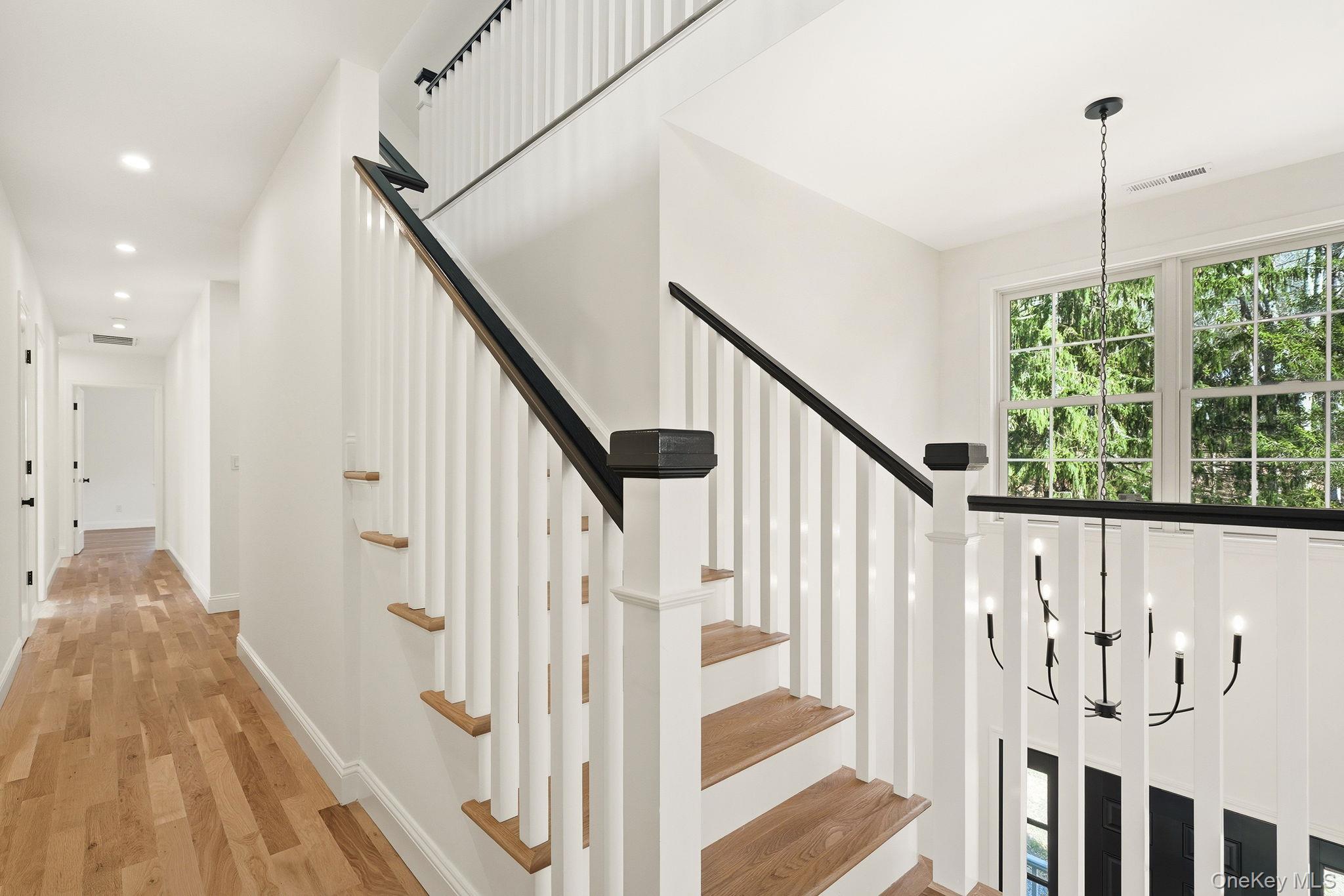 217 Greenwich Road Bedford, NY 10506 - Photo 32 of 45 Open staircase to 3rd floor