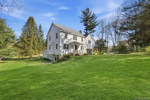 a view of a house with a big yard