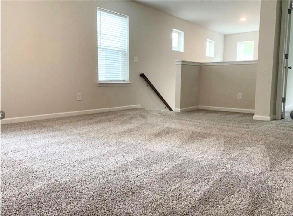 2979 Morgan Spring Trail Buford, GA 30519 - Photo 8 of 21 an empty room with windows