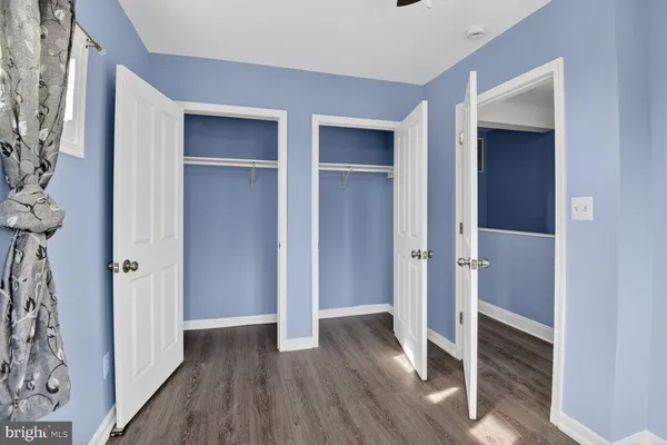 a view of entryway with wooden floor