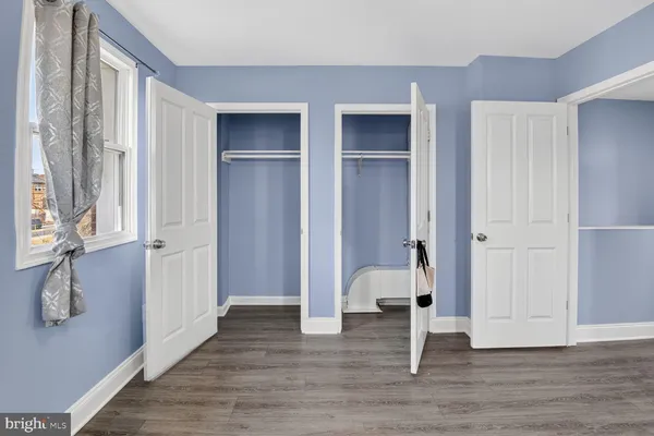 a view of entryway with wooden floor
