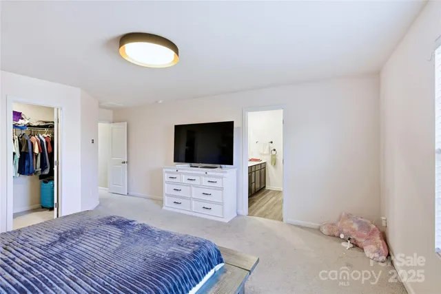 a bathroom with a granite countertop sink double and mirror