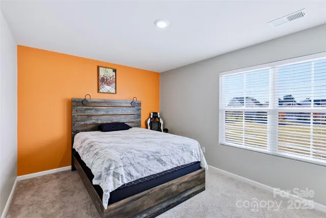 a bathroom with a sink double vanity and a mirror