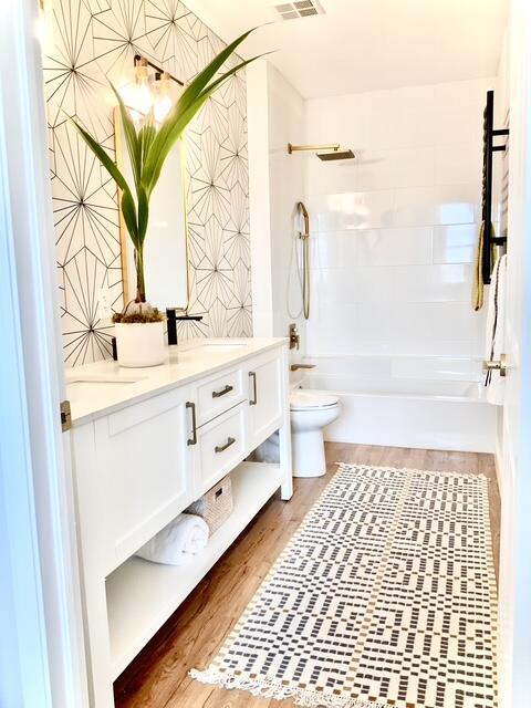 804 East Windward Way, Unit PH 21 Lantana, FL 33462 - Photo 23 of 46 a bathroom with a sink a toilet and a mirror