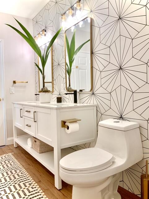 804 East Windward Way, Unit PH 21 Lantana, FL 33462 - Photo 24 of 46 a bathroom with a sink toilet and mirror