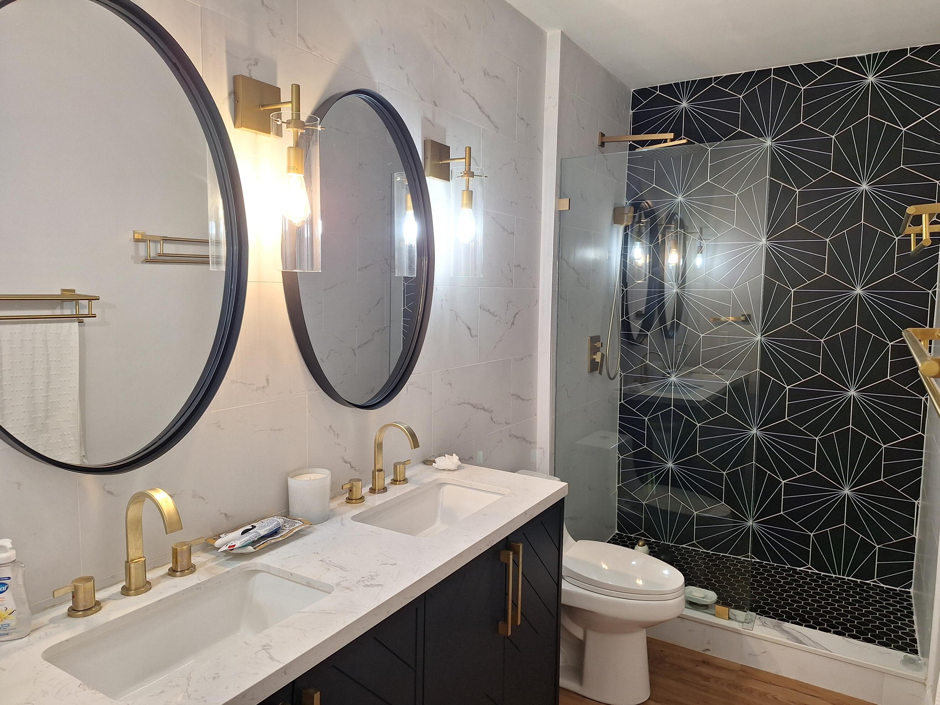 804 East Windward Way, Unit PH 21 Lantana, FL 33462 - Photo 27 of 46 a bathroom with a sink toilet and shower