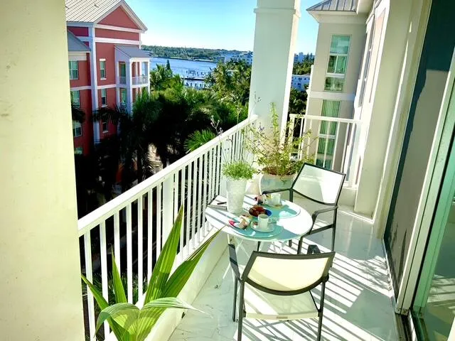 a view of a yard in front of a brick house