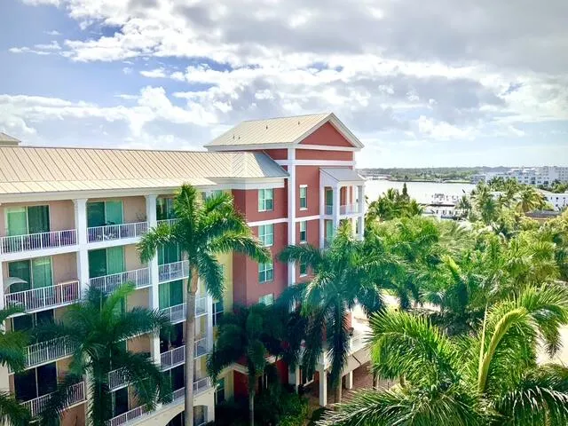 a view of a building with a yard