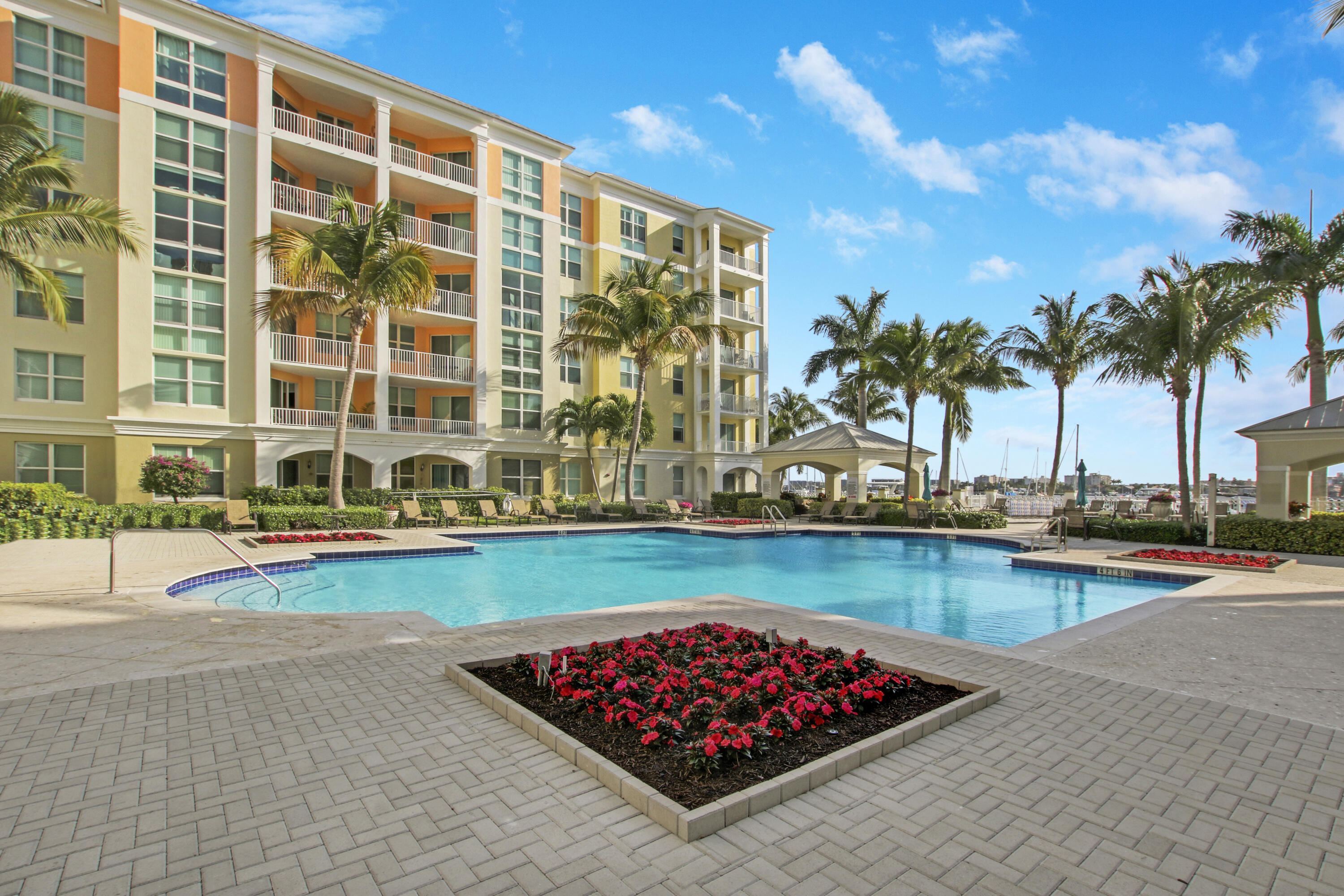 804 East Windward Way, Unit PH 21 Lantana, FL 33462 - Photo 32 of 46 a view of swimming pool with outdoor seating and plants