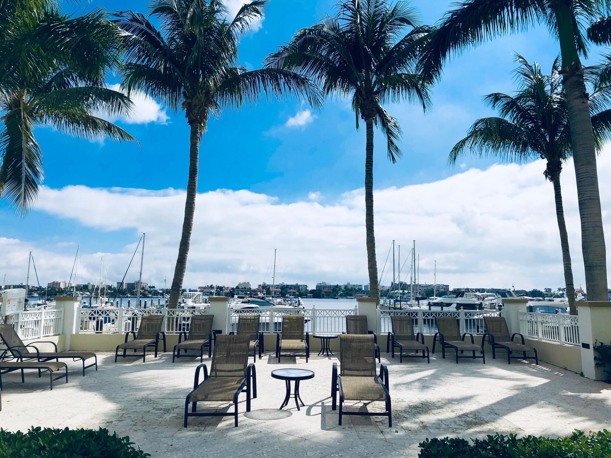 804 East Windward Way, Unit PH 21 Lantana, FL 33462 - Photo 36 of 46 a view of a terrace with palm trees