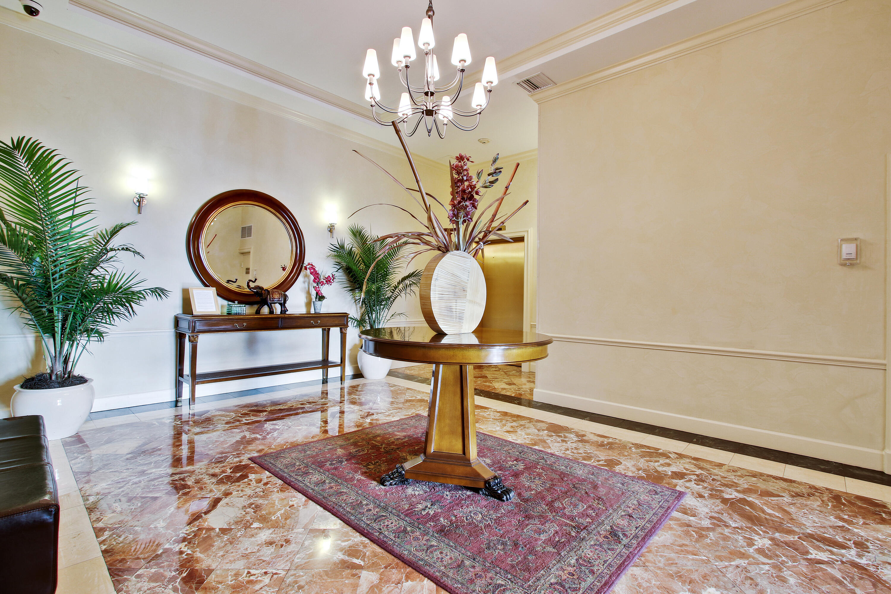 804 East Windward Way, Unit PH 21 Lantana, FL 33462 - Photo 45 of 46 a view of a chandelier in a room