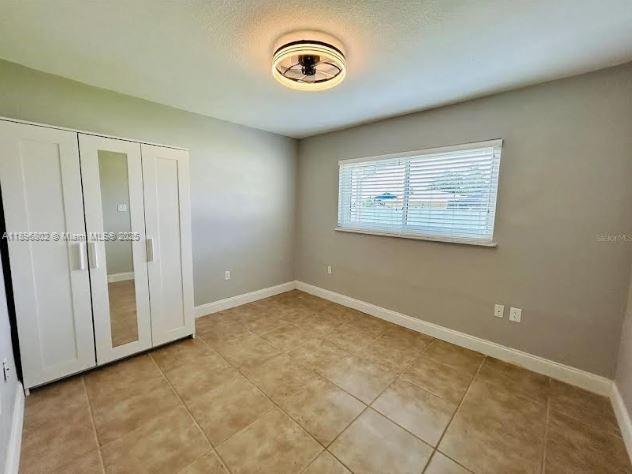 3147 Trevino Terrace, Unit 1 Punta Gorda, FL 33983 - Photo 12 of 48 an empty room with a window