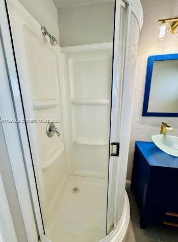 3147 Trevino Terrace, Unit 1 Punta Gorda, FL 33983 - Photo 16 of 48 a bathroom with a sink and a mirror