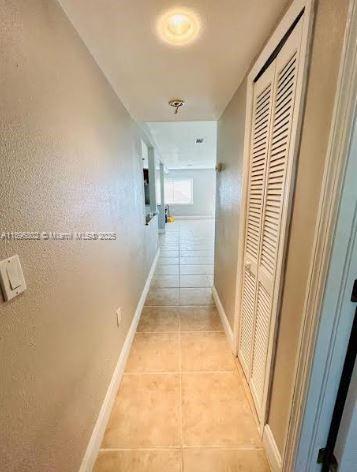 3147 Trevino Terrace, Unit 1 Punta Gorda, FL 33983 - Photo 20 of 48 a view of a hallway with wooden floor and staircase