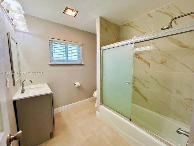 3147 Trevino Terrace, Unit 1 Punta Gorda, FL 33983 - Photo 26 of 48 a bathroom with a sink and a mirror