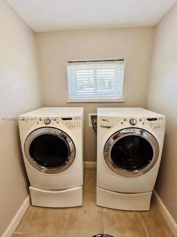 3147 Trevino Terrace, Unit 1 Punta Gorda, FL 33983 - Photo 28 of 48 a utility room with dryer and washer