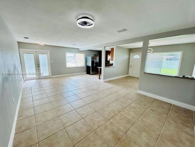 3147 Trevino Terrace, Unit 1 Punta Gorda, FL 33983 - Photo 4 of 48 a view of a livingroom with an empty space and window