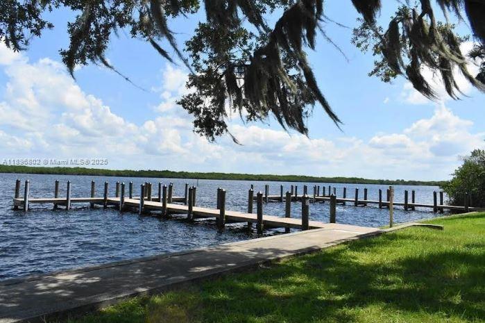 3147 Trevino Terrace, Unit 1 Punta Gorda, FL 33983 - Photo 41 of 48 a view of a house with backyard and sitting area