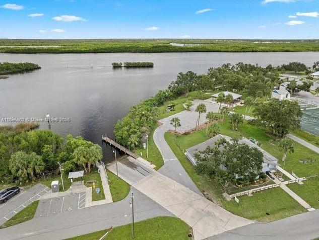 3147 Trevino Terrace, Unit 1 Punta Gorda, FL 33983 - Photo 42 of 48 a view of a lake with a outdoor space