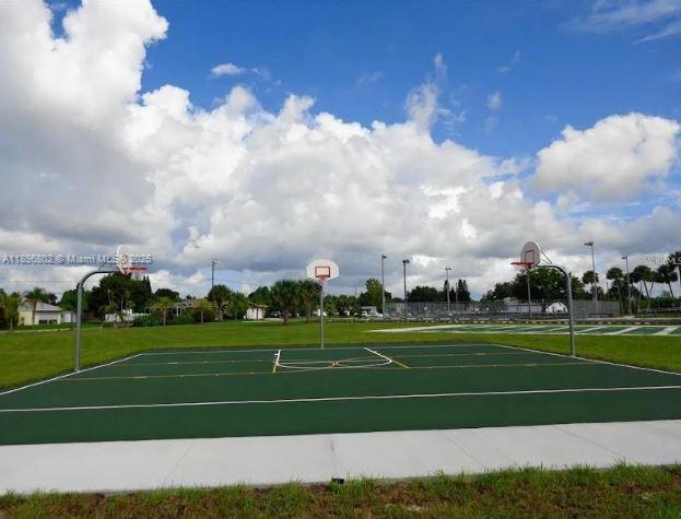 3147 Trevino Terrace, Unit 1 Punta Gorda, FL 33983 - Photo 45 of 48 a view of a white and a large trees