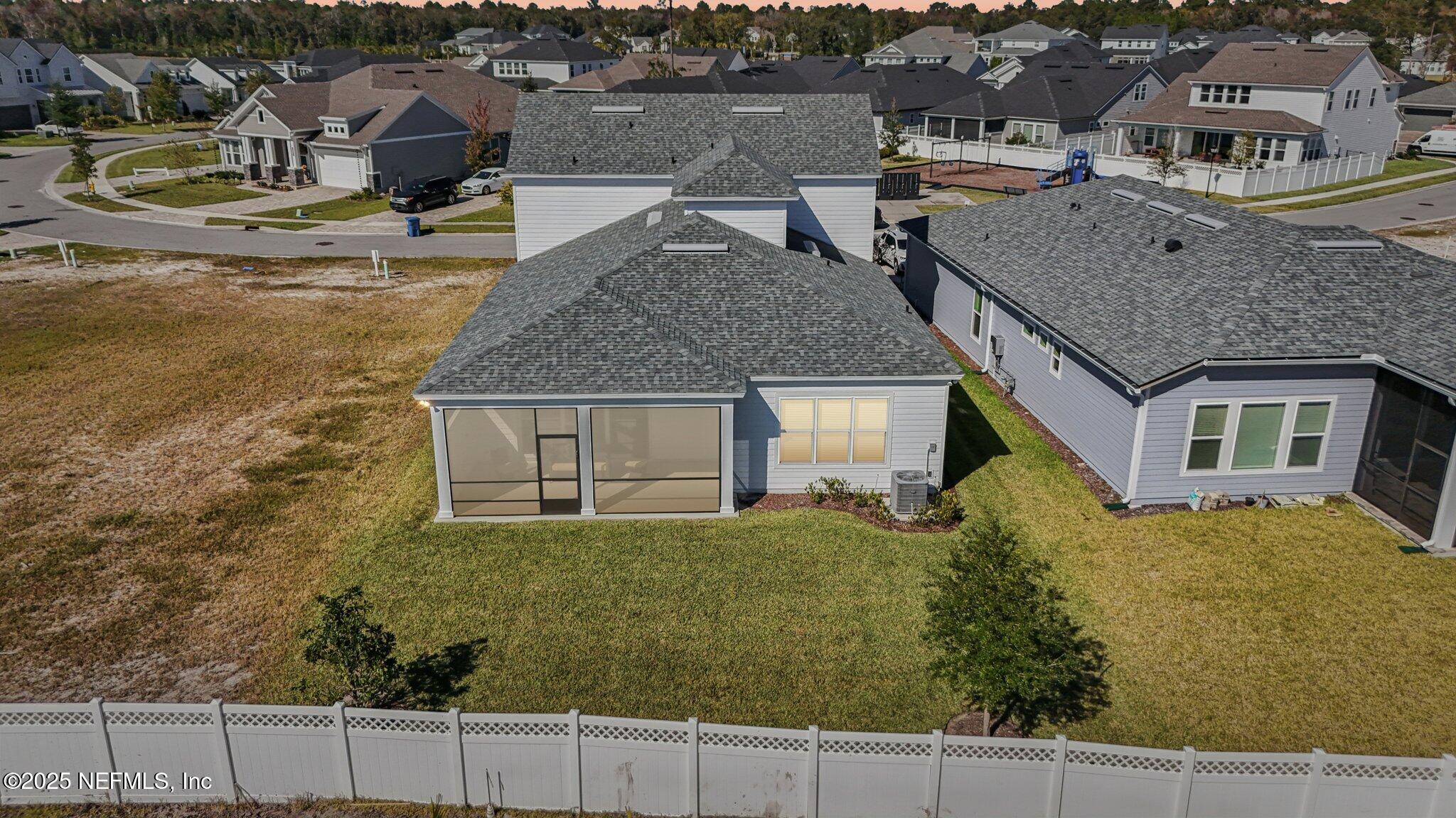 112 Rose Bud Lane St. Augustine, FL 32092 - Photo 12 of 66 an aerial view of a house with garden