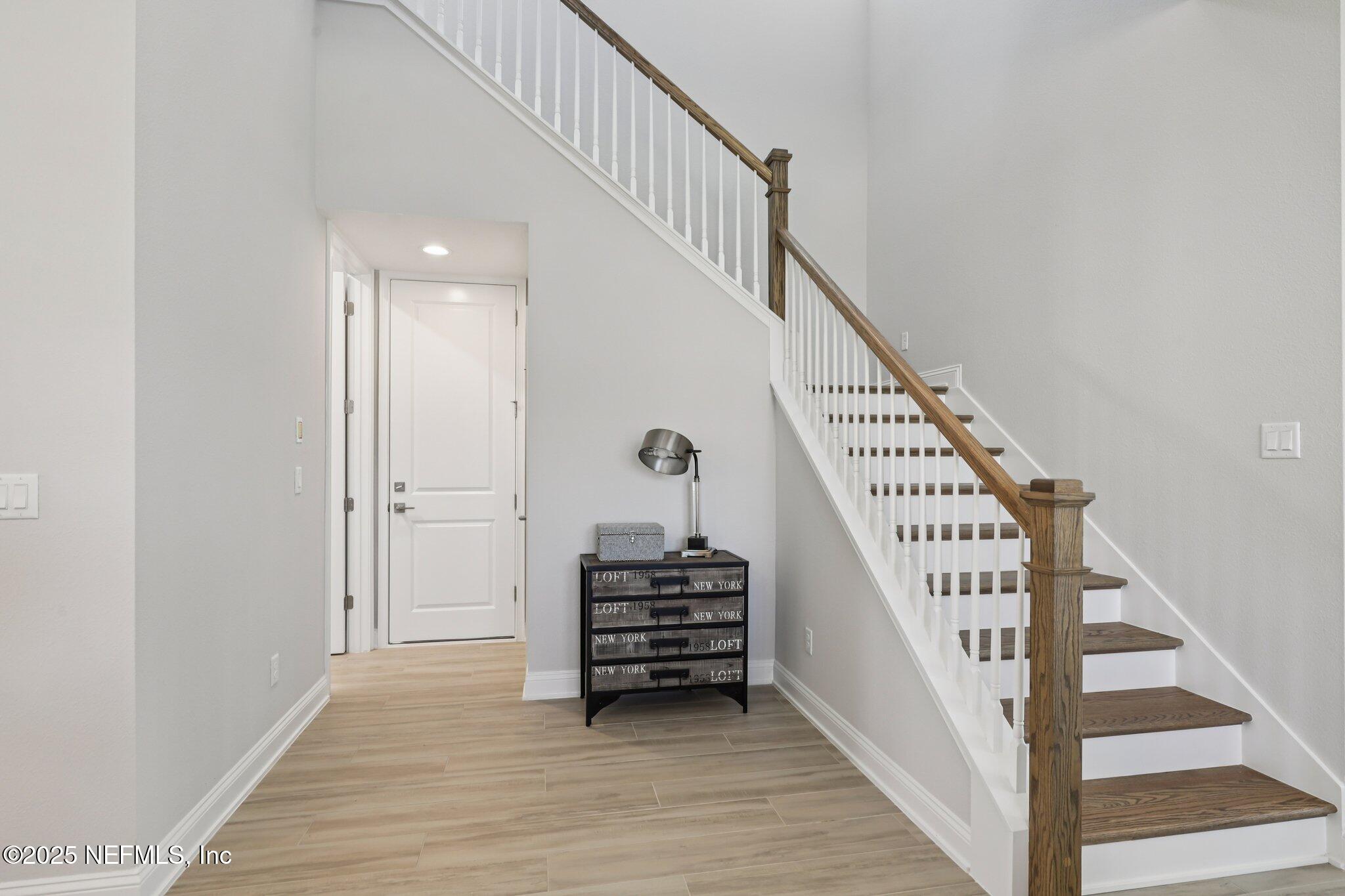 112 Rose Bud Lane St. Augustine, FL 32092 - Photo 32 of 66 a view of a hallway with stairs