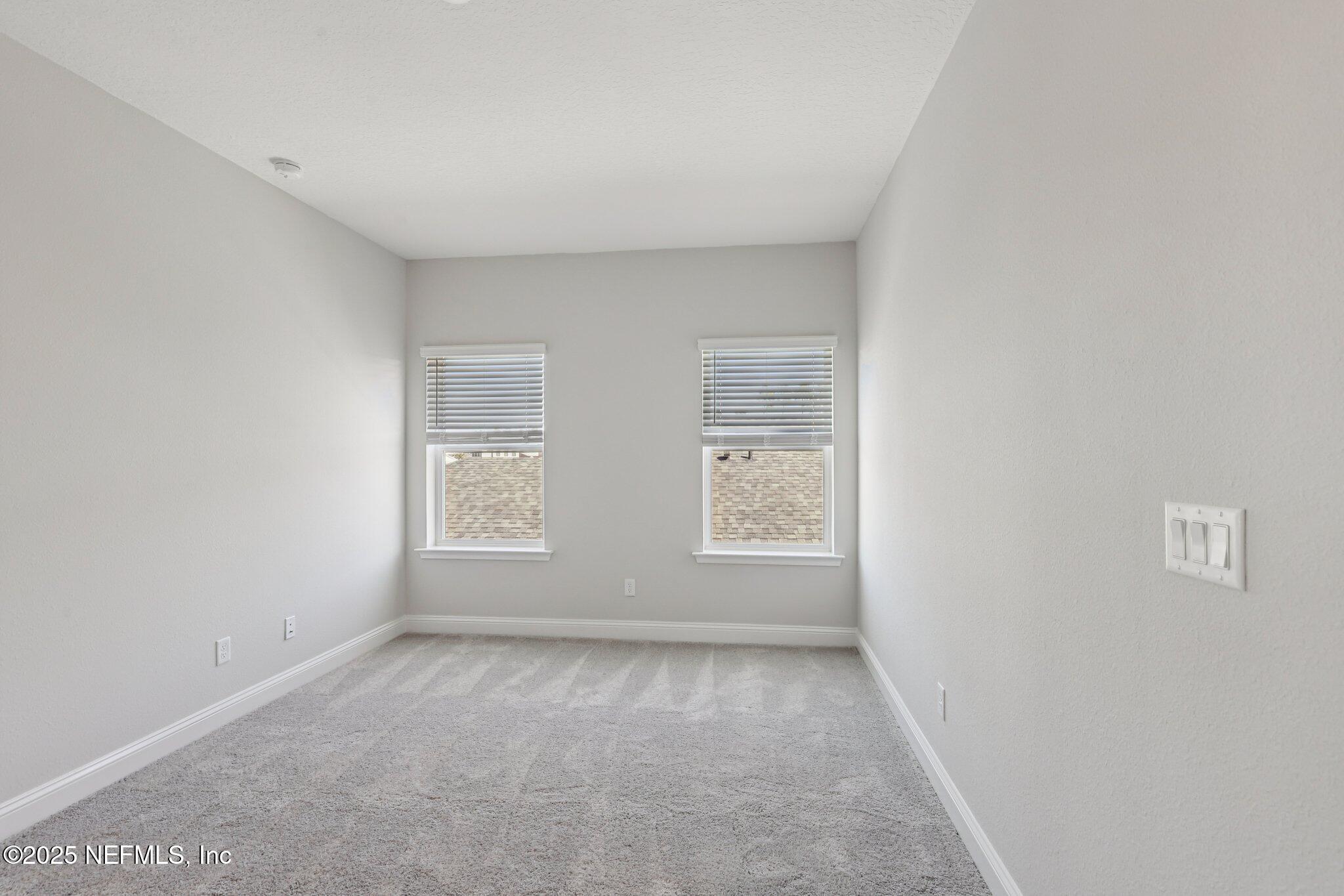 112 Rose Bud Lane St. Augustine, FL 32092 - Photo 46 of 66 an empty room with windows