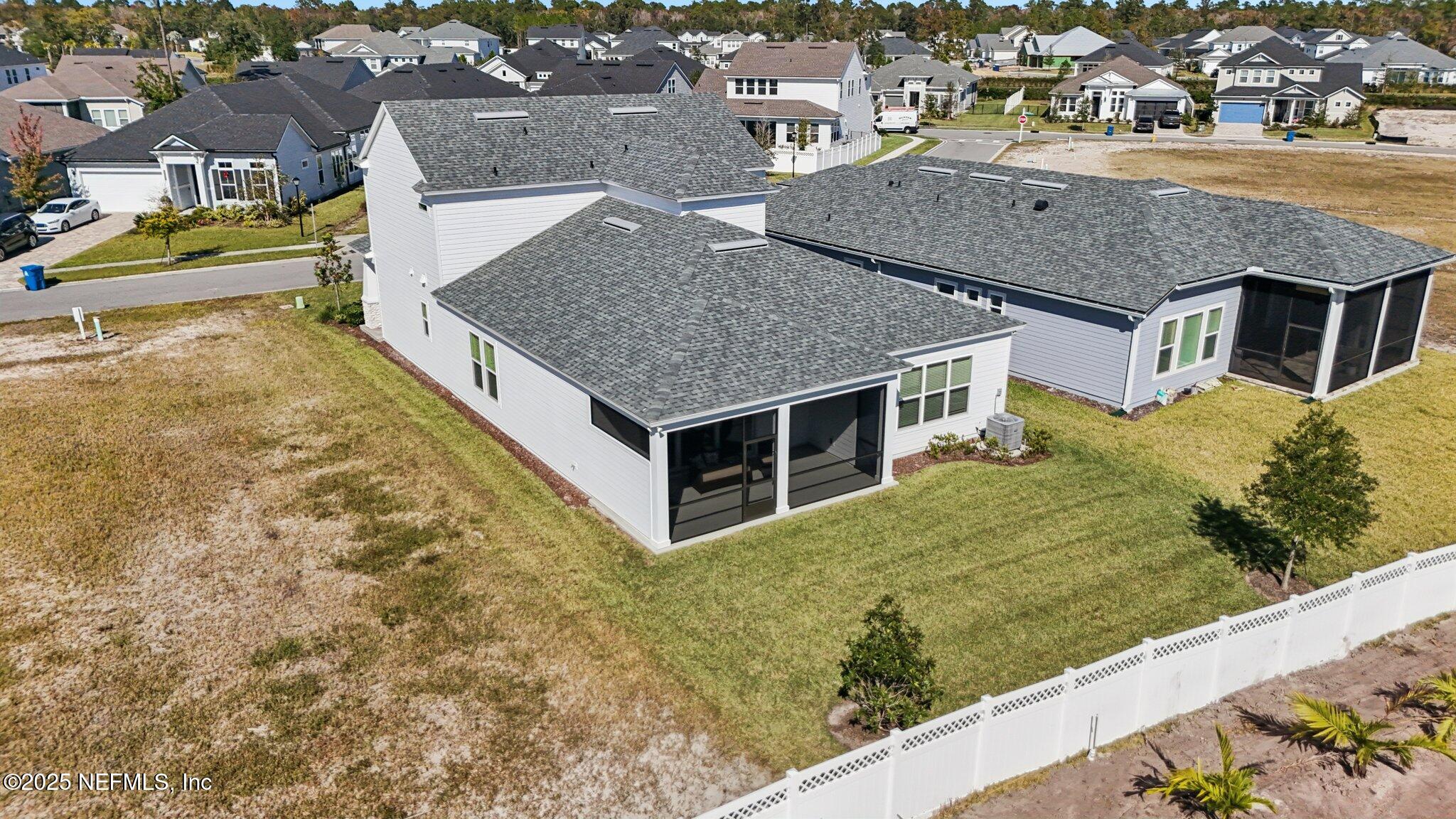 112 Rose Bud Lane St. Augustine, FL 32092 - Photo 9 of 66 an aerial view of residential houses with yard