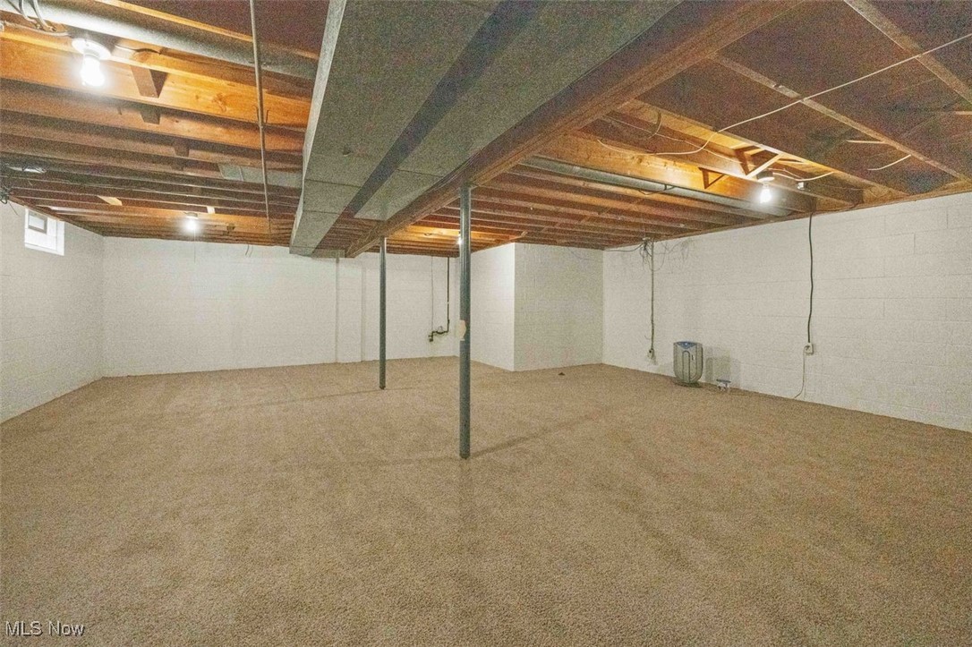 1586 Norledge Road Akron, OH 44305 - Photo 22 of 24 Below grade area with carpet floors