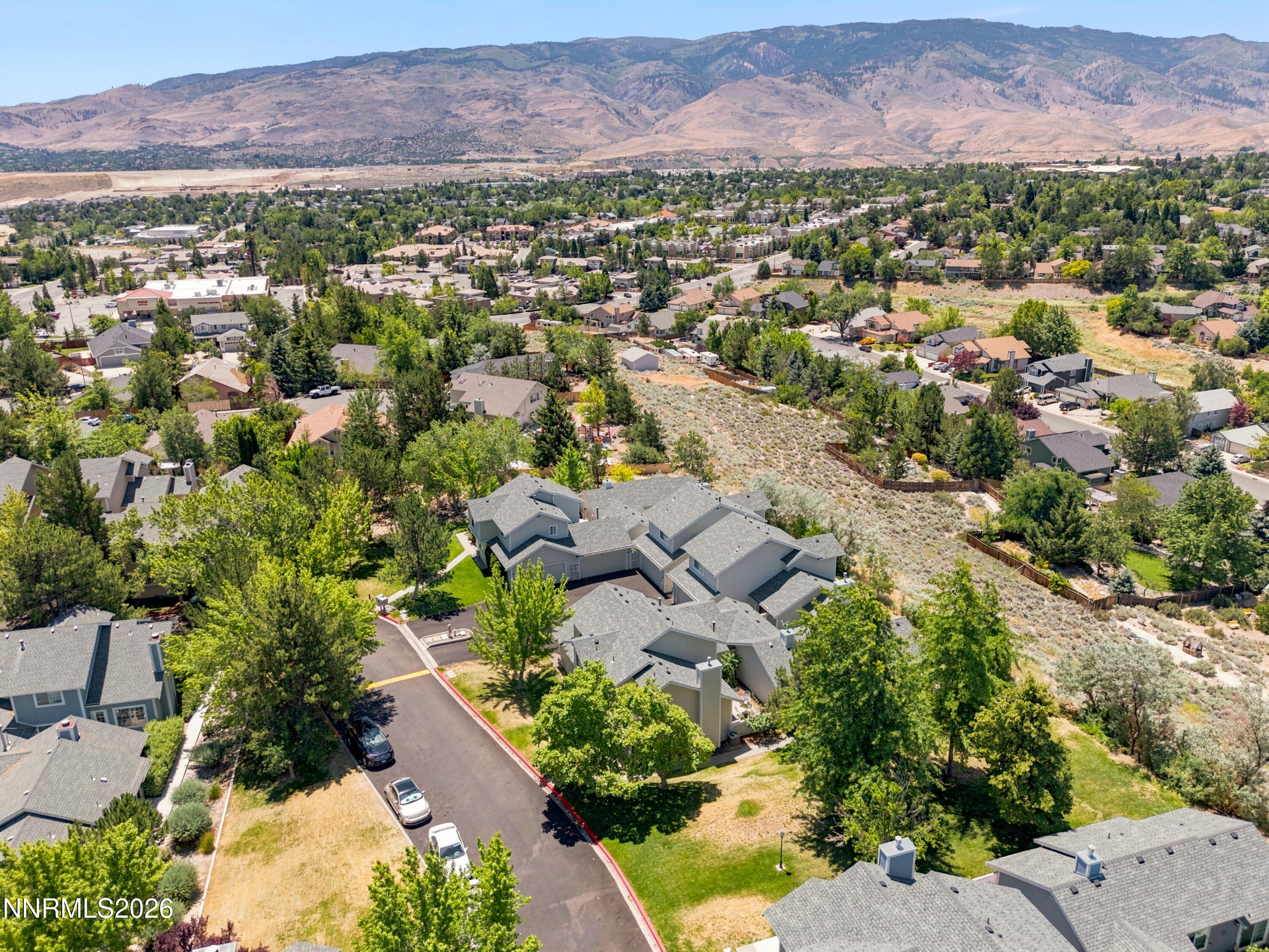 1899 Tuolumne Drive Reno, NV 89523 - Photo 39 of 44 an aerial view of a city with lots of residential buildings