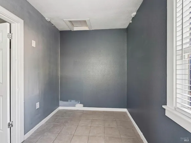 an empty room with windows