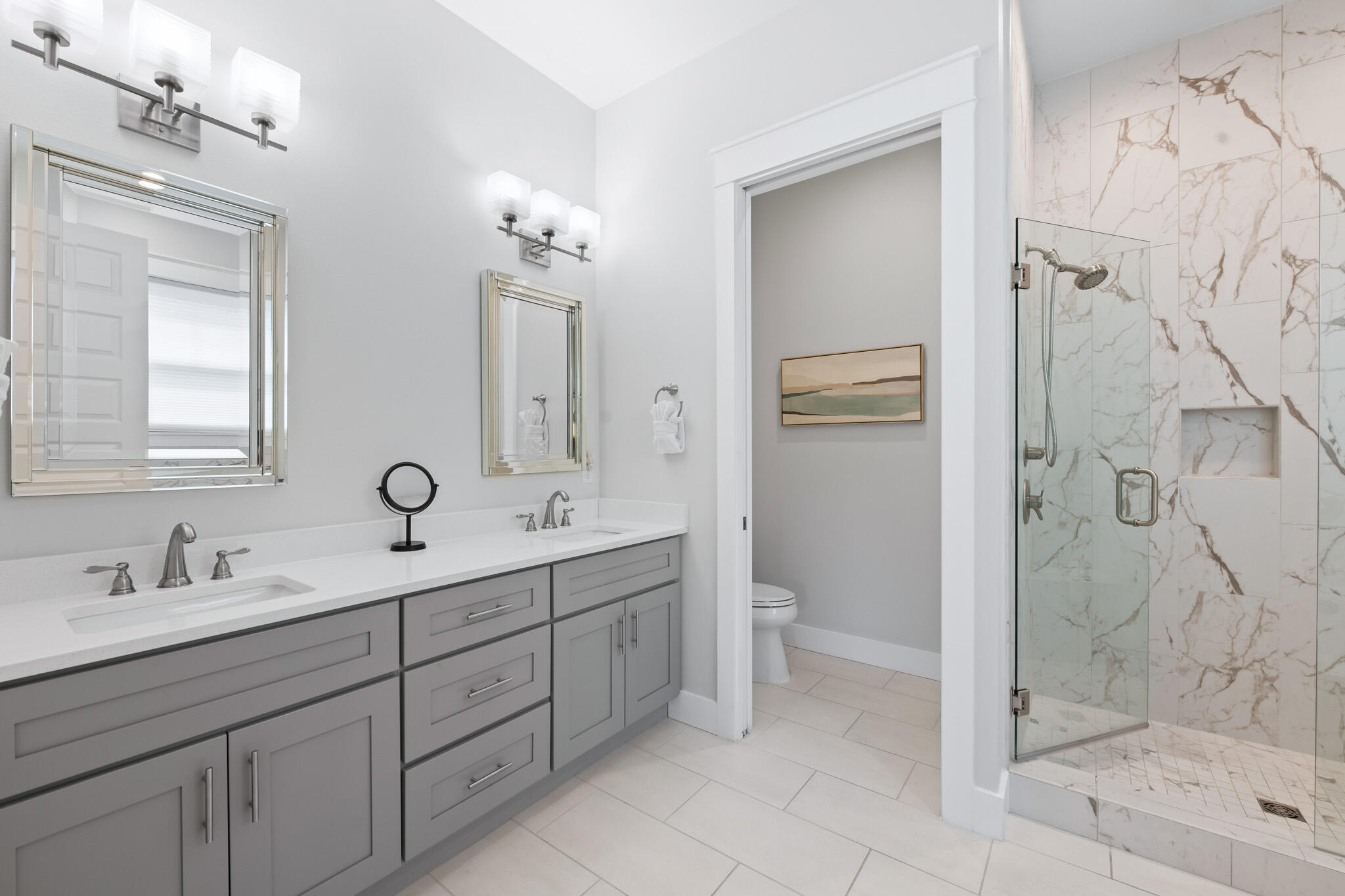 500 Gulfview Circle Santa Rosa Beach, FL 32459 - Photo 26 of 69 a bathroom with a double vanity sink mirror and shower