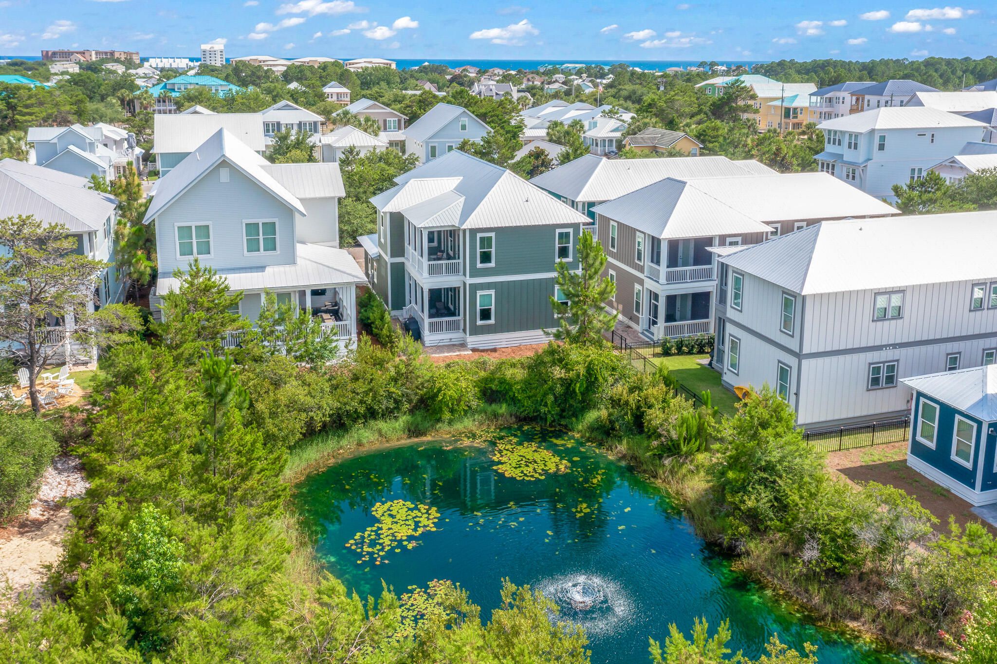 500 Gulfview Circle Santa Rosa Beach, FL 32459 - Photo 62 of 69 an aerial view of a house with a garden and lake view