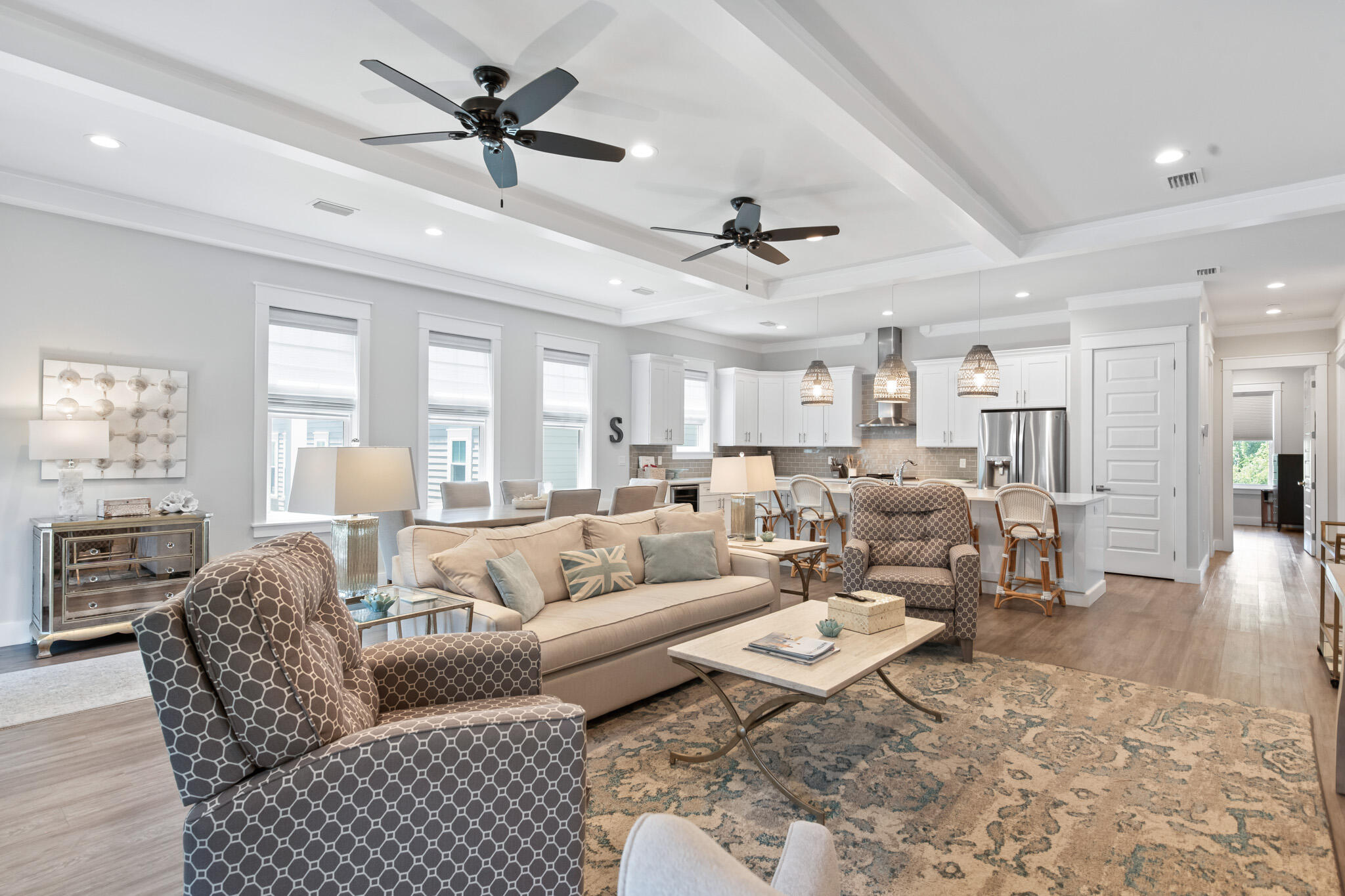 500 Gulfview Circle Santa Rosa Beach, FL 32459 - Photo 7 of 69 a living room with furniture ceiling fan and a rug