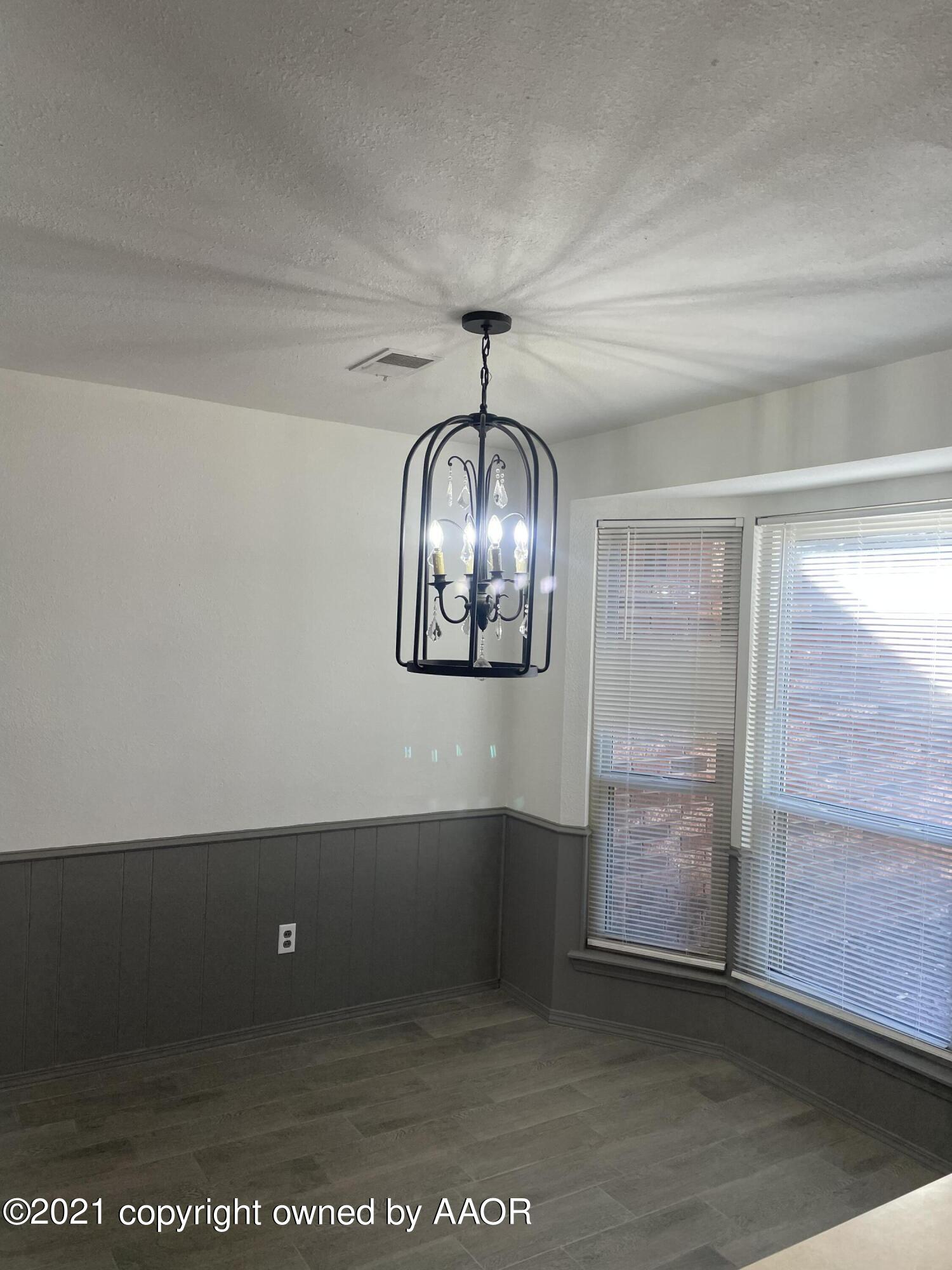 5309 Wheeler Lane Amarillo, TX 79110 - Photo 8 of 20 an empty room with a space