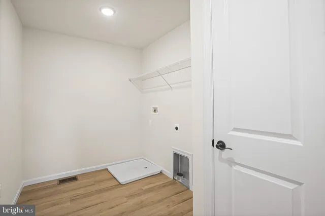 a view of a room with an empty space