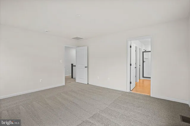 a bathroom with a double vanity sink mirror and double