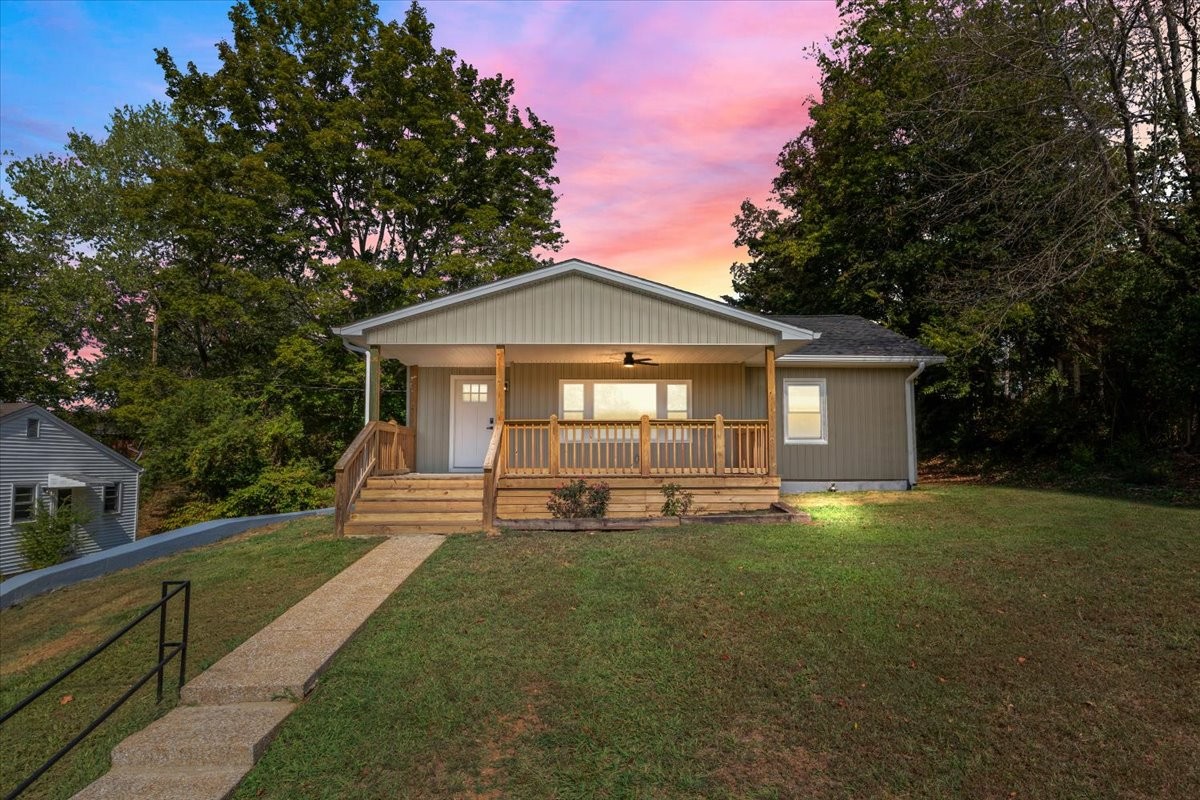 422 High Street Dickson, TN 37055 - Photo 1 of 58 a front view of a house with a yard