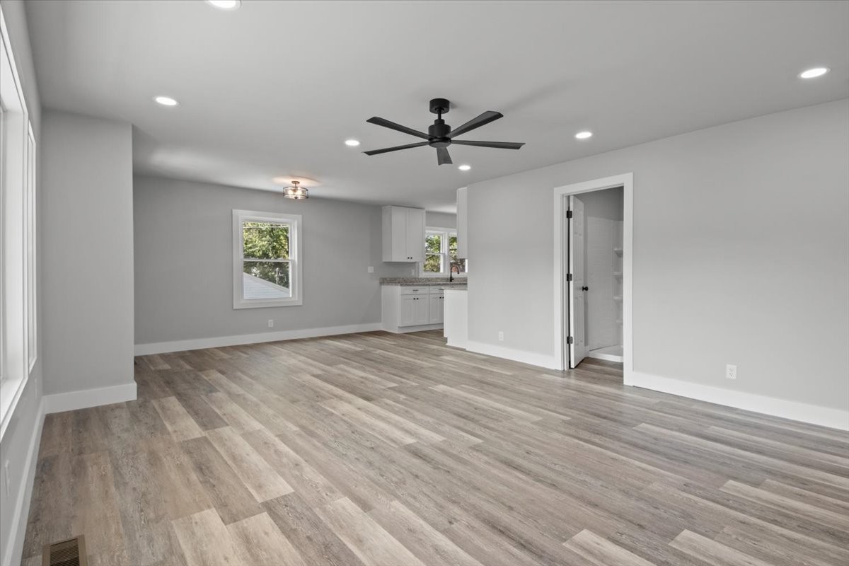 422 High Street Dickson, TN 37055 - Photo 11 of 58 wooden floor in an empty room with a window