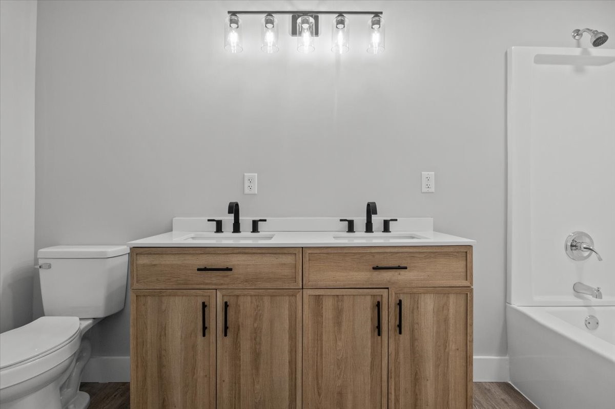 422 High Street Dickson, TN 37055 - Photo 22 of 58 a view of bathroom with dual sinks
