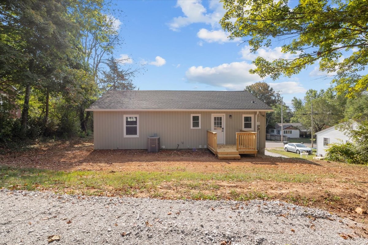 422 High Street Dickson, TN 37055 - Photo 41 of 58 a view of a house with a yard covered in snow
