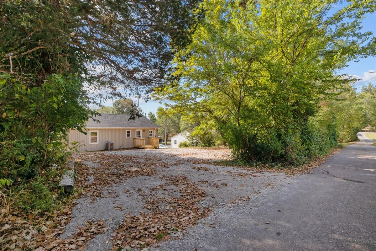 422 High Street Dickson, TN 37055 - Photo 42 of 58 a view of a house with a tree and a yard
