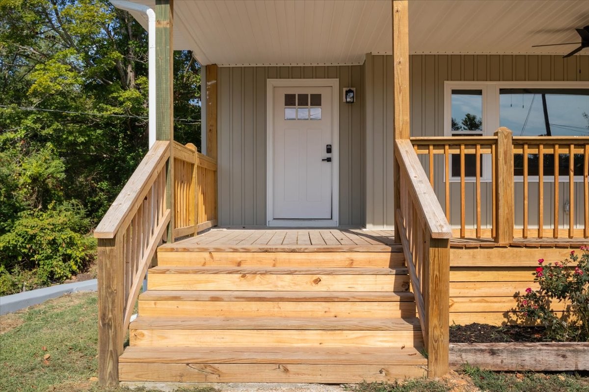 422 High Street Dickson, TN 37055 - Photo 6 of 58 a view of staircase with white walls and railing